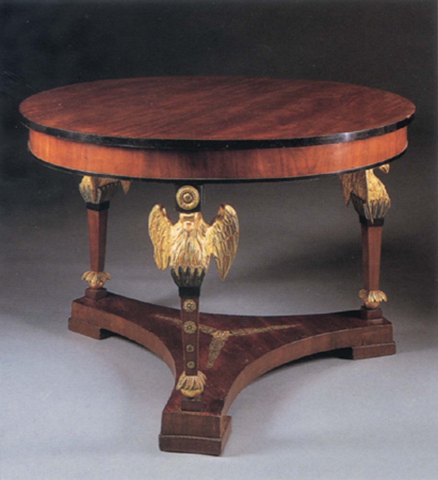 19th Century AUSTRIAN, Neoclassical Mahogany and Parcel Gilt Center Table, 1800-1825
Mixed woods, 29 x 43 x 43 in. (73.7 x 109.2 x 109.2 cm)
Circular top with an ebonized border above the plain frieze, raised on winged eagle terminal supports joined by a tripartite stretcher with later ormolu decoration, all on block feet.
AUS-001-FU
$40,000
